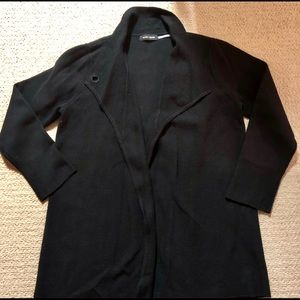 Black knit cardigan with toggle closure at neck
